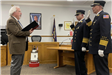Two Officers Raising Their Hand While Taking an Oath 4