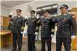 Four Officers Raising Their Hand While Taking an Oath 1