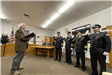Four Officers Raising Their Hand While Taking an Oath 3