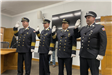 Four Officers Raising Their Hand While Taking an Oath 4