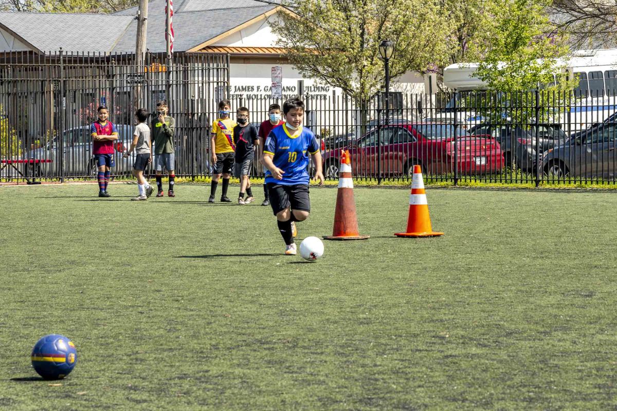 Kid Kicking a Soccer Ball 1