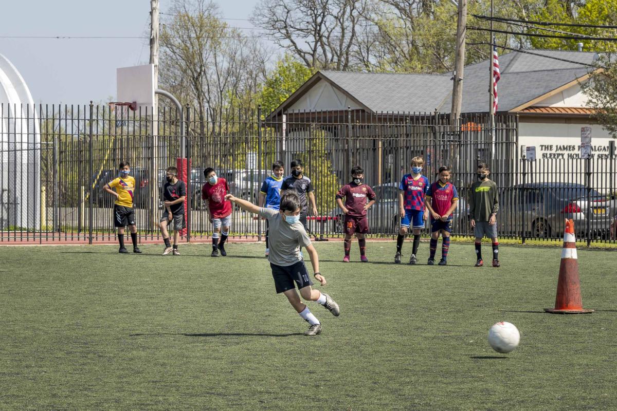 Kid Kicking a Soccer Ball 3